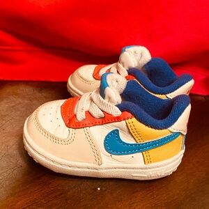 Nike Kids Sneakers with Blue, Red, and Yellow